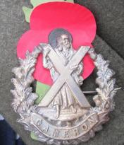 241110 Camerons cap badge